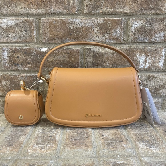lululemon athletica Handbags - NWT Lululemon Cactus "Leather" Mini Bag In Chestnut Brown/Gold